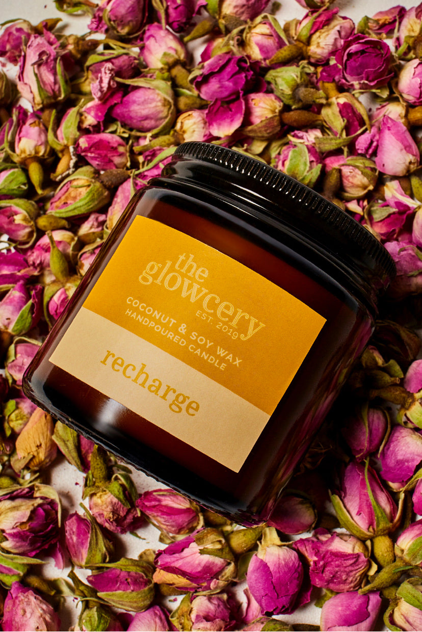 Natural candle handmade with coconut and soy wax and rose geranium and patchouli essential oils